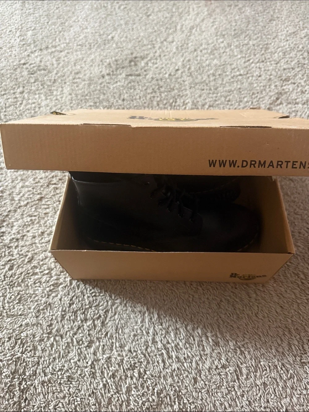 Dr. Martens Black Leather 8-Eye Lace-Up Boots with Yellow Stitching